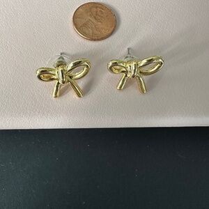 Gold tone bow earrings
